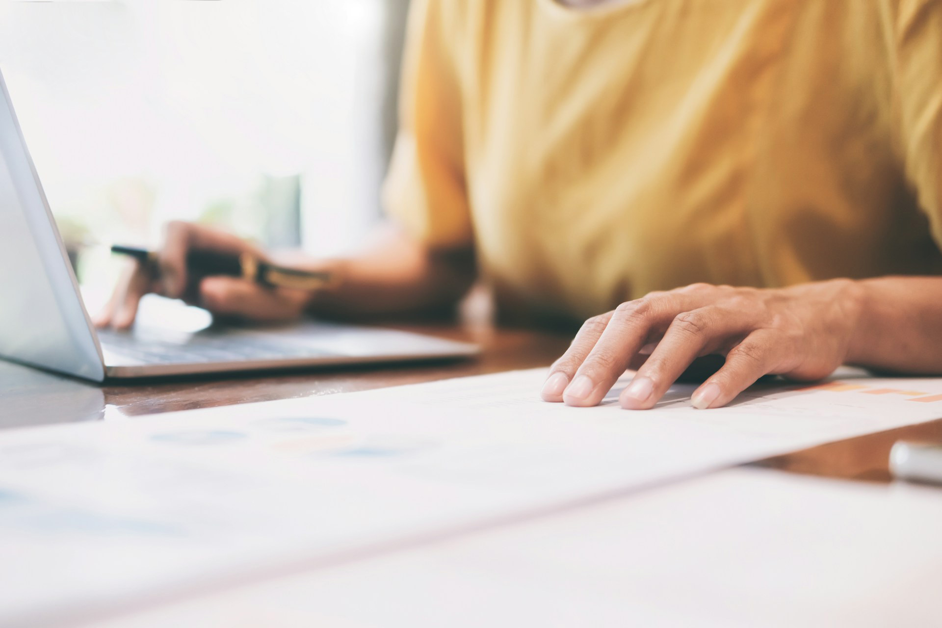bookkeeping-services Hands of a person doing bookkeeping on their laptop